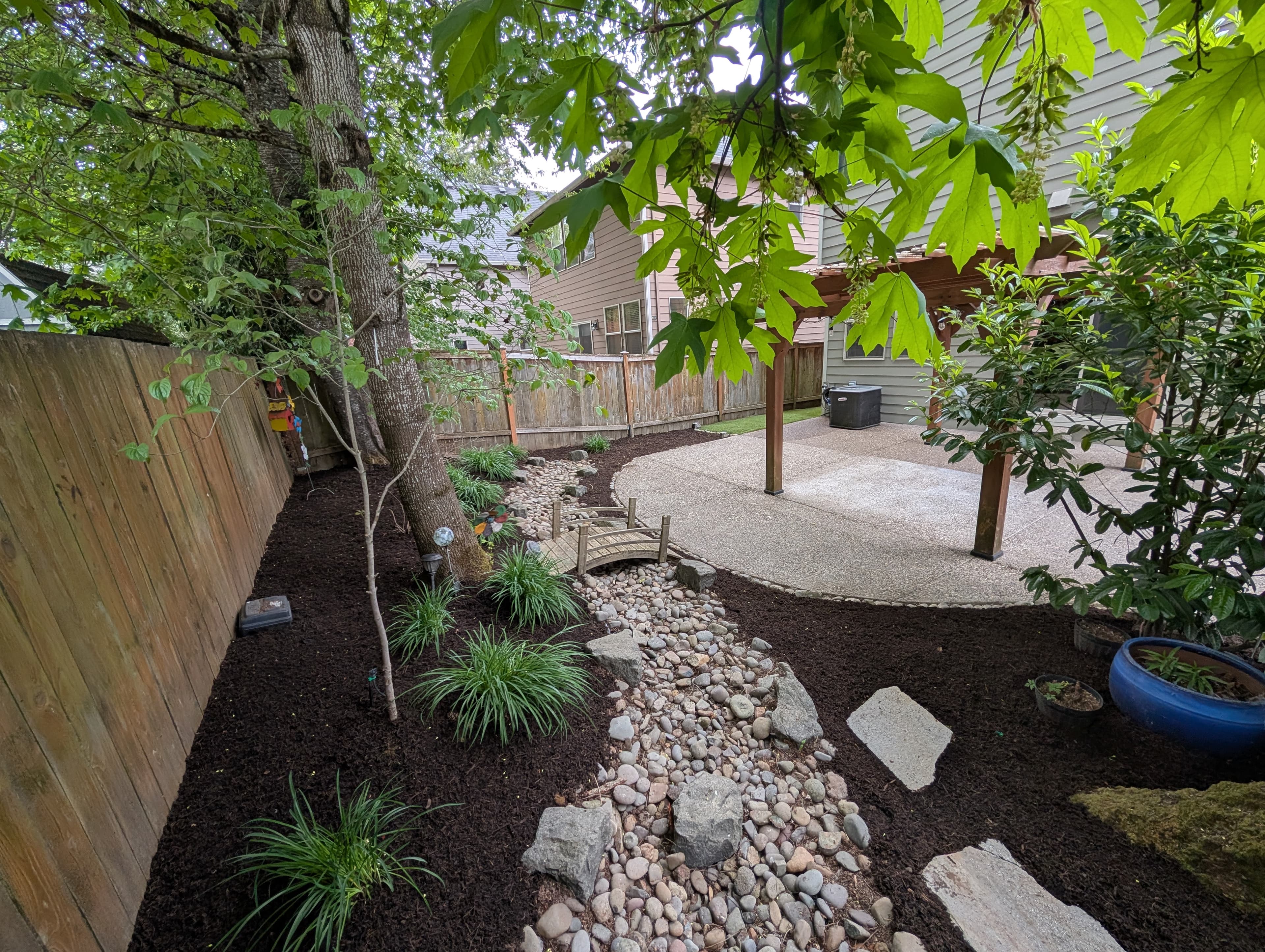 Backyard project bench and planters corner