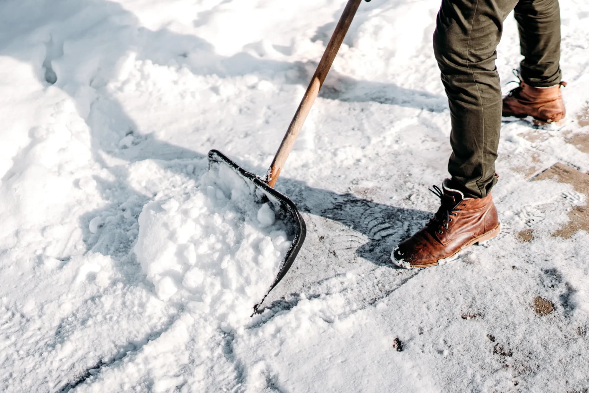 Shoveling snow from a walkway